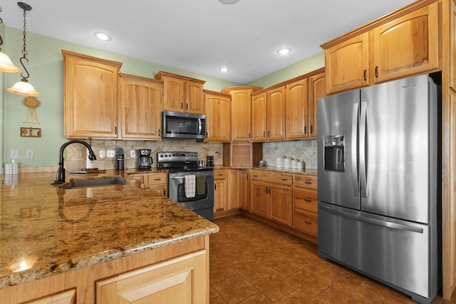 kitchen featuring pendant lighting, sink, stainless steel appliances, light stone countertops, and decorative backsplash