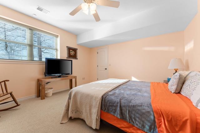 carpeted bedroom with ceiling fan