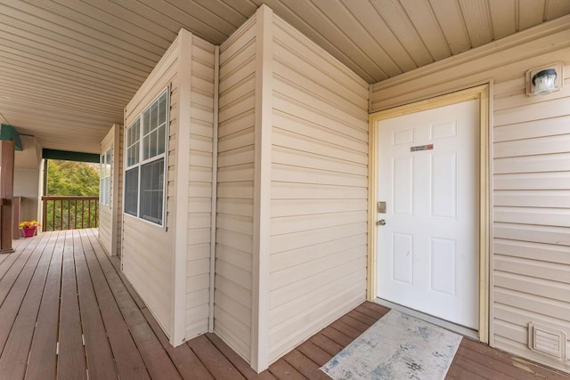 doorway to property featuring a porch