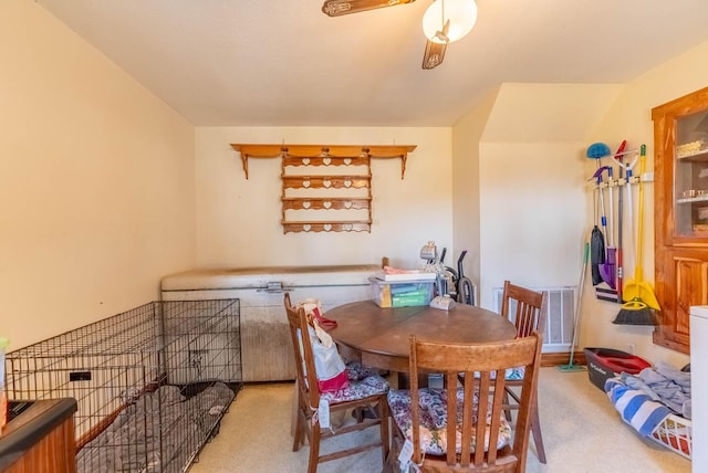 view of carpeted dining area