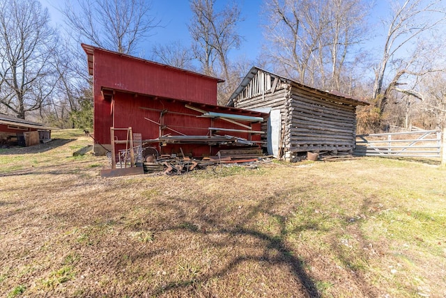 view of outbuilding with a lawn