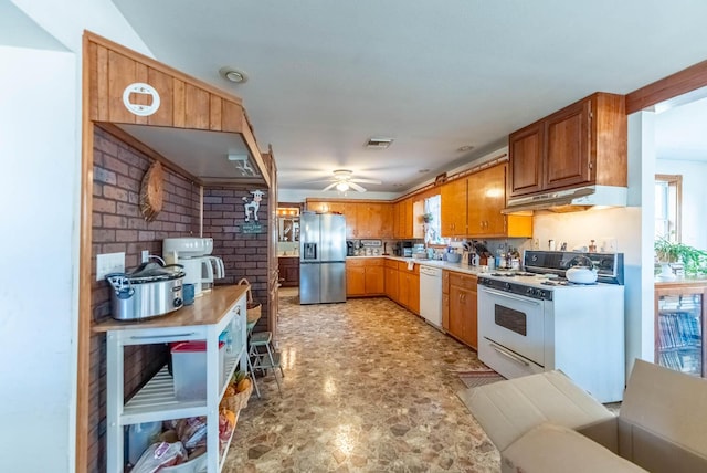 kitchen with ceiling fan and white appliances