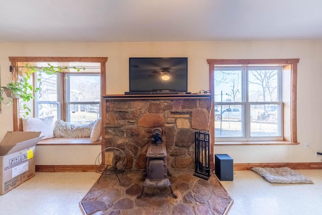 living room with a wood stove