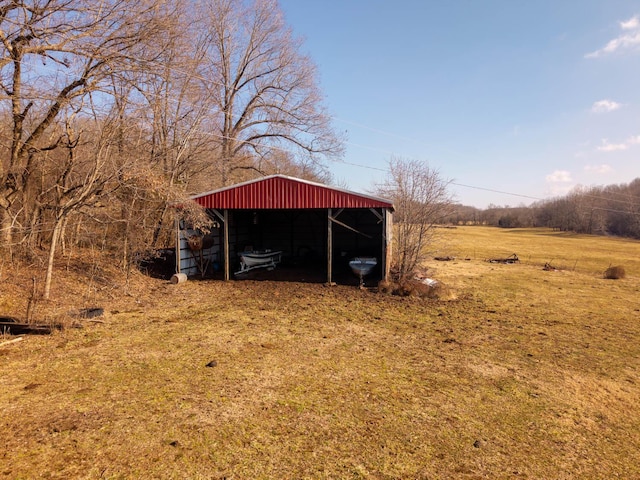 view of outdoor structure featuring a rural view