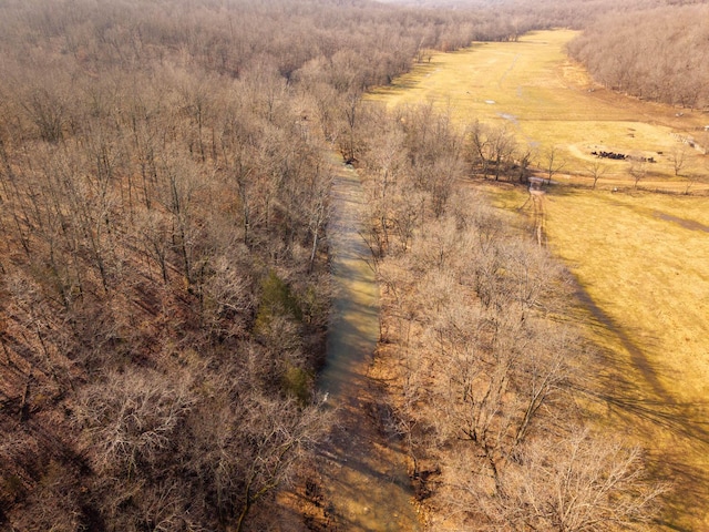 birds eye view of property featuring a rural view