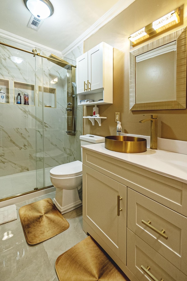 bathroom featuring ornamental molding, toilet, an enclosed shower, and vanity