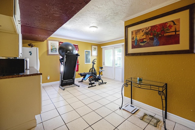 exercise room featuring ornamental molding, electric panel, a textured ceiling, and light tile patterned floors