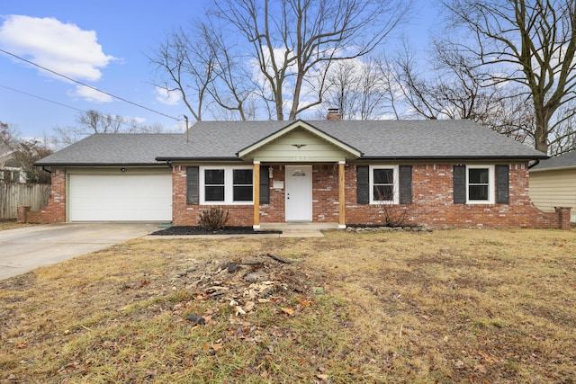 ranch-style home with a garage and a front yard