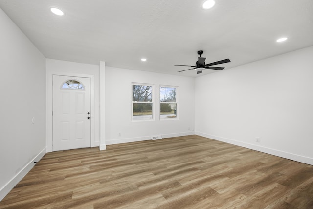 foyer featuring ceiling fan and hardwood / wood-style floors