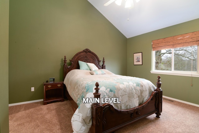 carpeted bedroom featuring ceiling fan and lofted ceiling