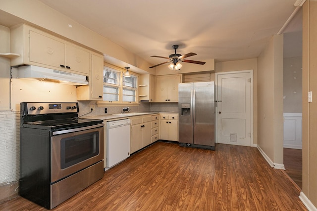 kitchen with sink, dark wood-type flooring, ceiling fan, and appliances with stainless steel finishes