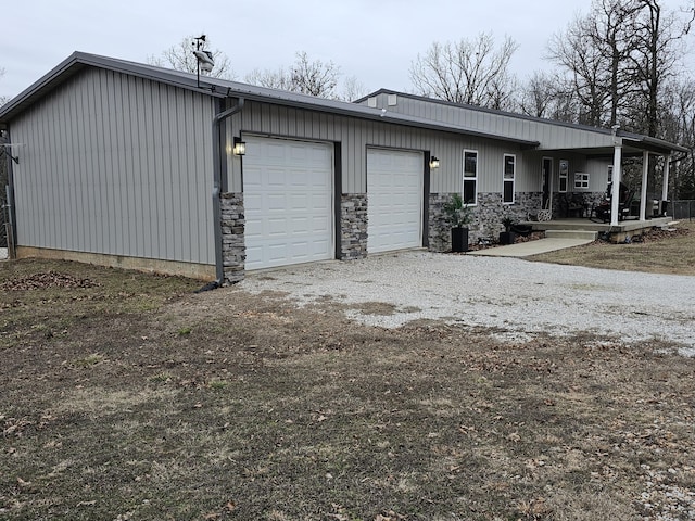 garage with covered porch