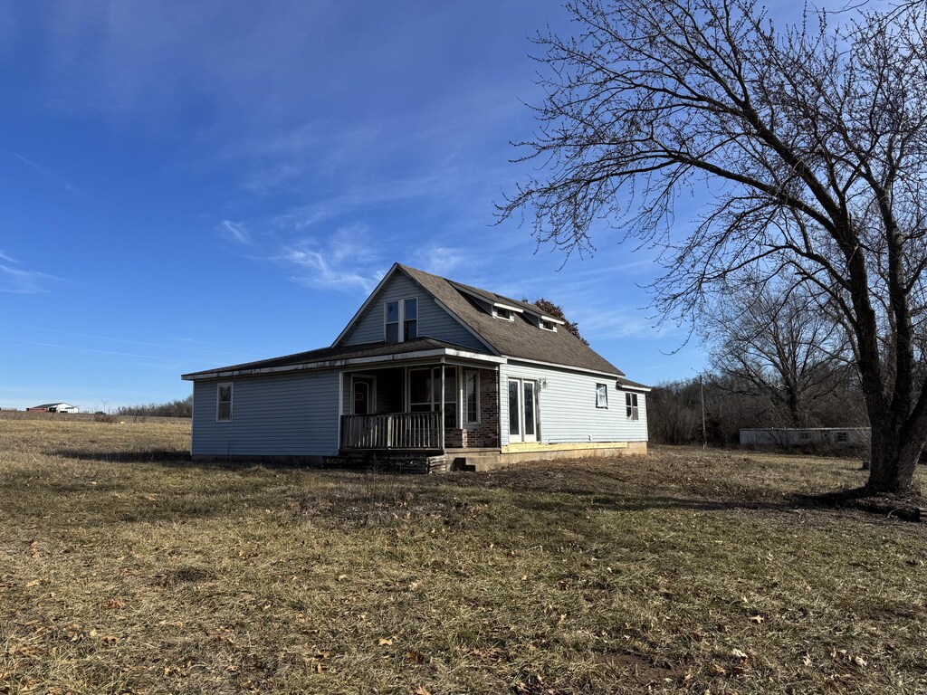 9982 Lawrence Unit 1000, La Russell, MO 64848 - back of property with a yard