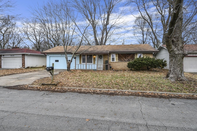 single story home featuring a garage