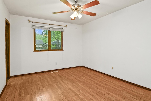 853 E Guinevere St, Springfield, MO 65807 - spare room featuring light wood-type flooring, baseboards, and a ceiling fan