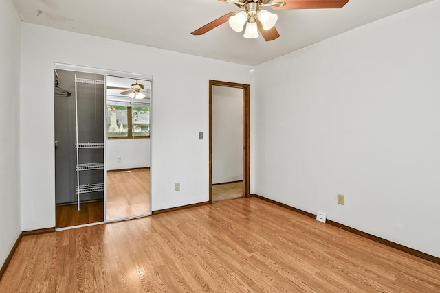 853 E Guinevere St, Springfield, MO 65807 - unfurnished bedroom with wood finished floors, baseboards, a closet, and ceiling fan