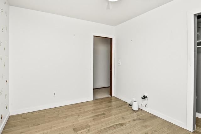 853 E Guinevere St, Springfield, MO 65807 - empty room with light wood finished floors and baseboards