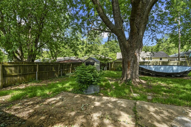 853 E Guinevere St, Springfield, MO 65807 - fenced backyard featuring a patio area