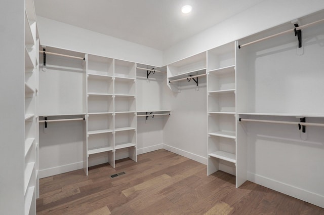 walk in closet featuring wood-type flooring