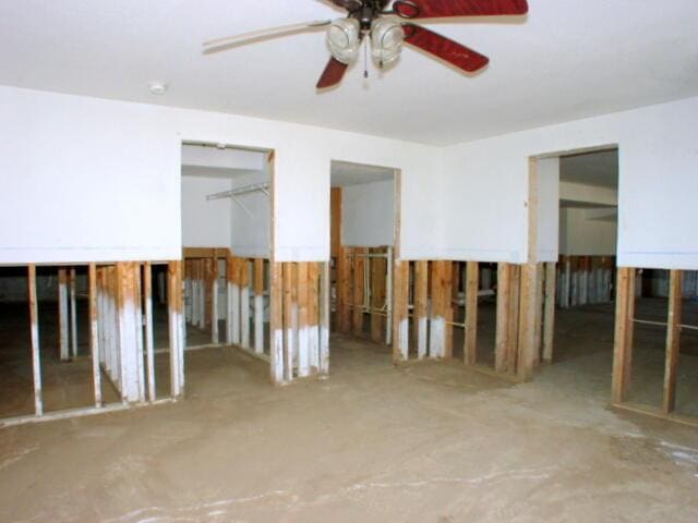 unfurnished room featuring a ceiling fan