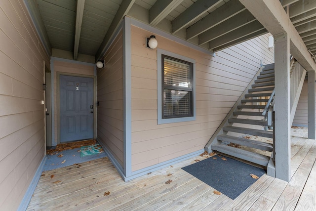 doorway to property with a wooden deck