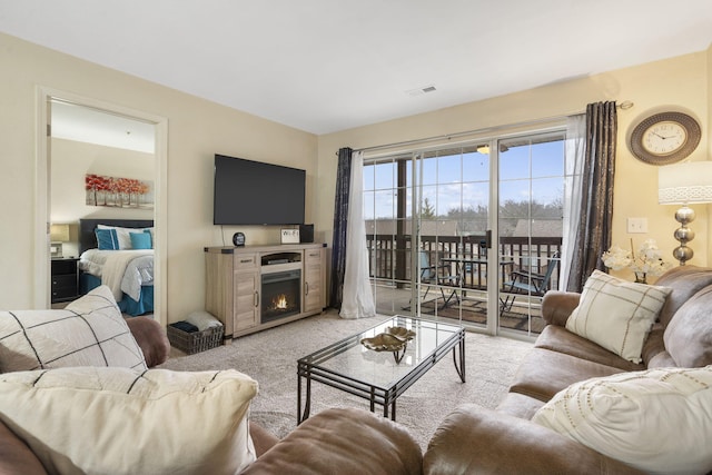 living room with light colored carpet