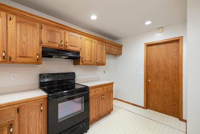 kitchen featuring black range with electric cooktop