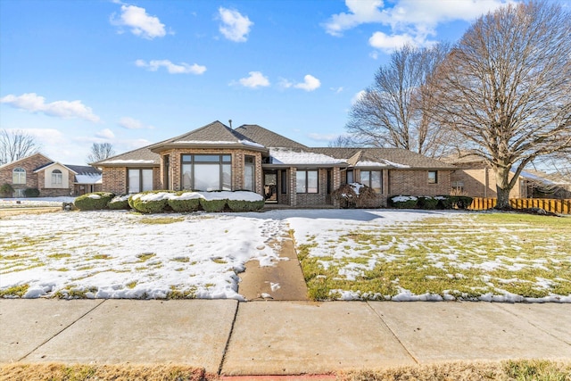 view of front of home with a yard