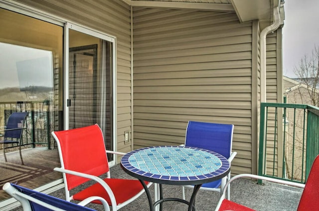 balcony featuring outdoor dining space