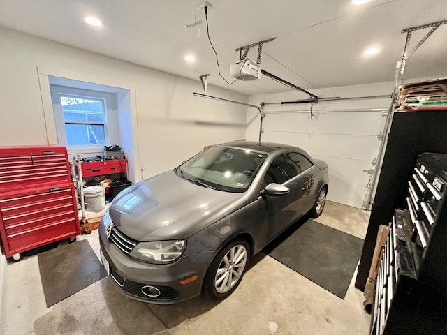 garage featuring a garage door opener