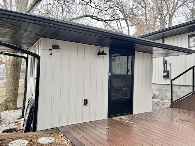 property entrance with a wooden deck