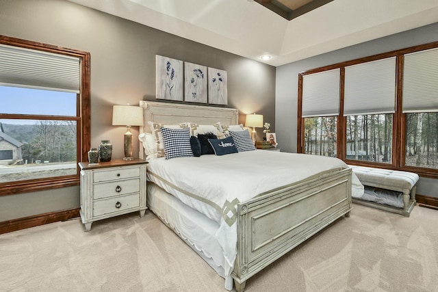 bedroom featuring light colored carpet