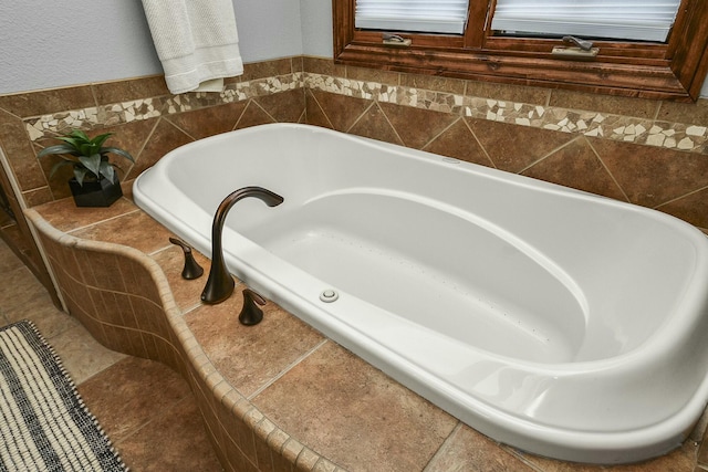 bathroom featuring tiled bath