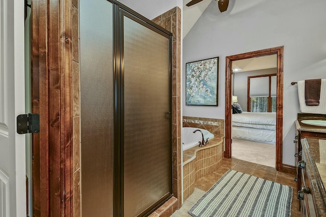 bathroom with ceiling fan, vanity, separate shower and tub, and tile patterned flooring