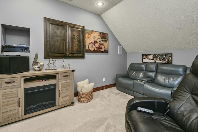 interior space featuring dark brown cabinetry, vaulted ceiling, light colored carpet, and a textured ceiling