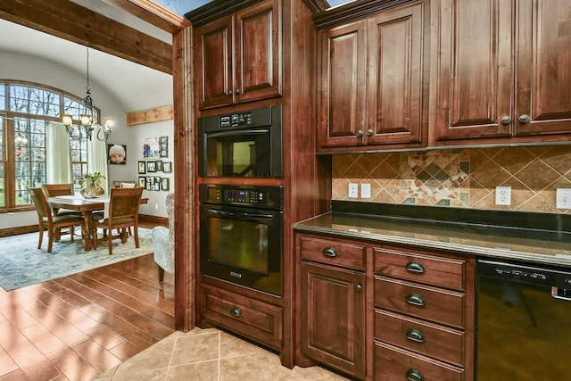 kitchen featuring decorative backsplash, vaulted ceiling, black appliances, and light wood-type flooring