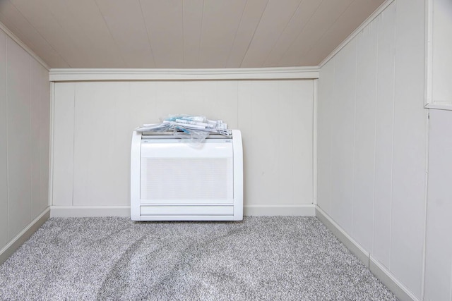 interior space with crown molding and carpet floors