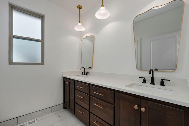 bathroom featuring vanity