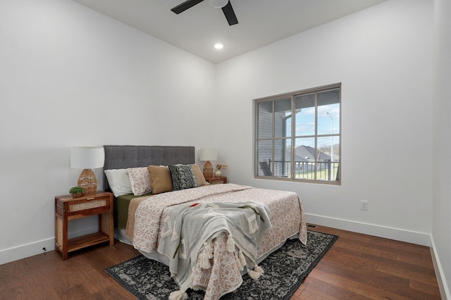 bedroom featuring dark wood-type flooring and ceiling fan