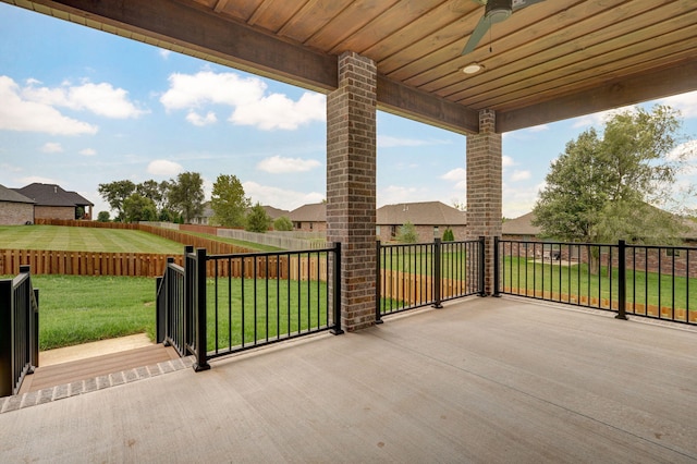 view of patio featuring ceiling fan