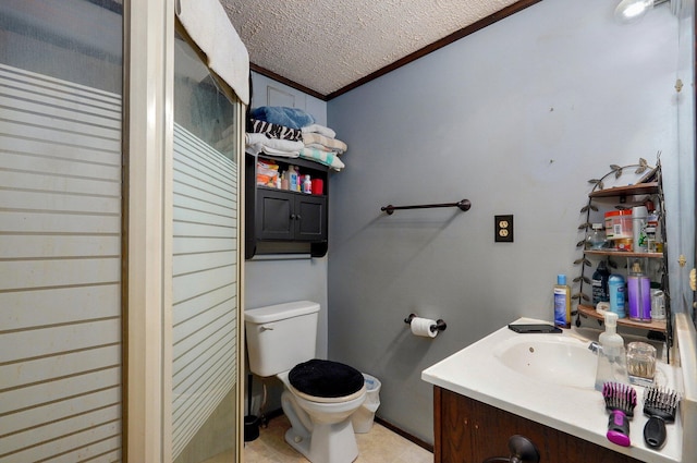 bathroom with crown molding, tile patterned flooring, vanity, a textured ceiling, and toilet