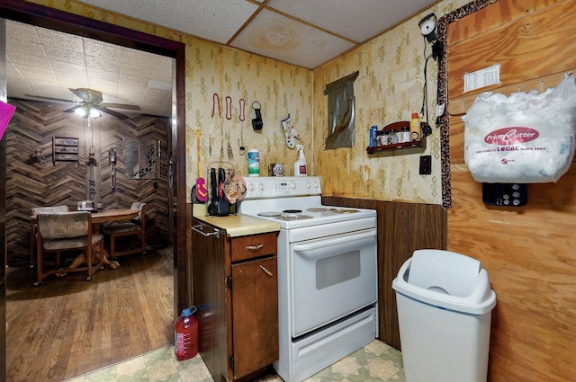 kitchen with white electric range and ceiling fan