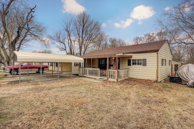 ranch-style house featuring a porch and a front lawn