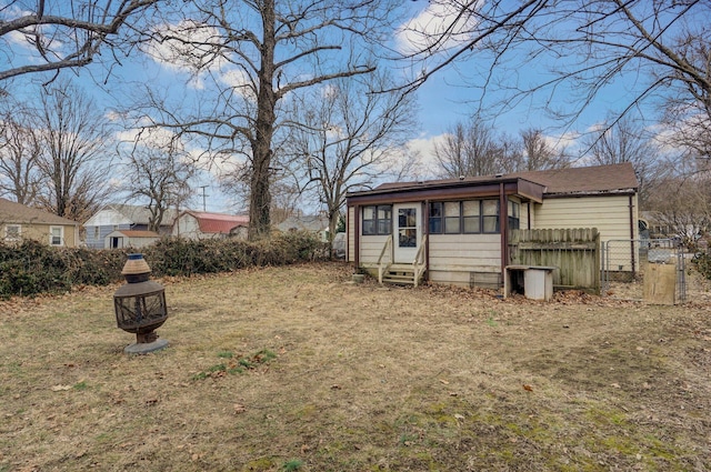 view of yard with a fire pit