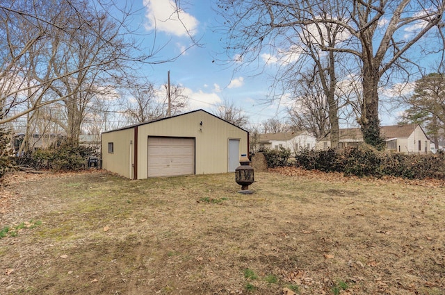 garage with a lawn