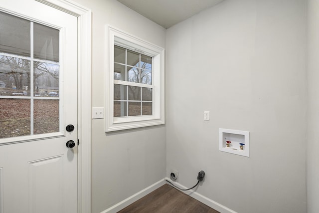 washroom featuring hookup for an electric dryer, washer hookup, and dark hardwood / wood-style floors