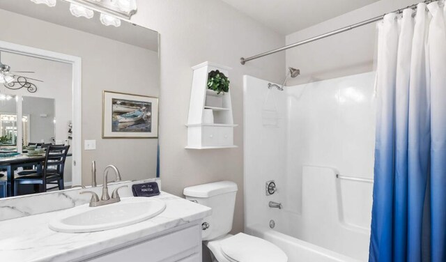 31 Golfshores Dr Unit 19, Branson, MO 65616 - full bathroom with ceiling fan, vanity, toilet, and shower / tub combo