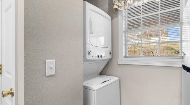 31 Golfshores Dr Unit 19, Branson, MO 65616 - washroom featuring stacked washer / drying machine