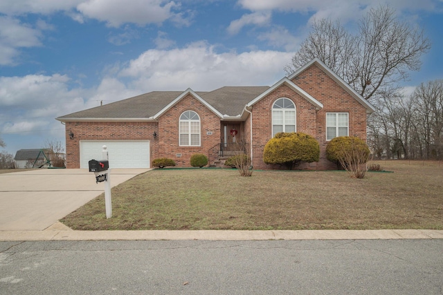 ranch-style house featuring a garage and a front yard