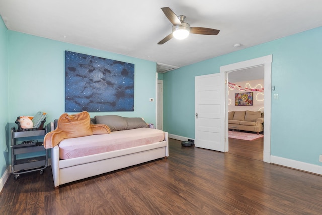 bedroom featuring dark wood-type flooring and ceiling fan